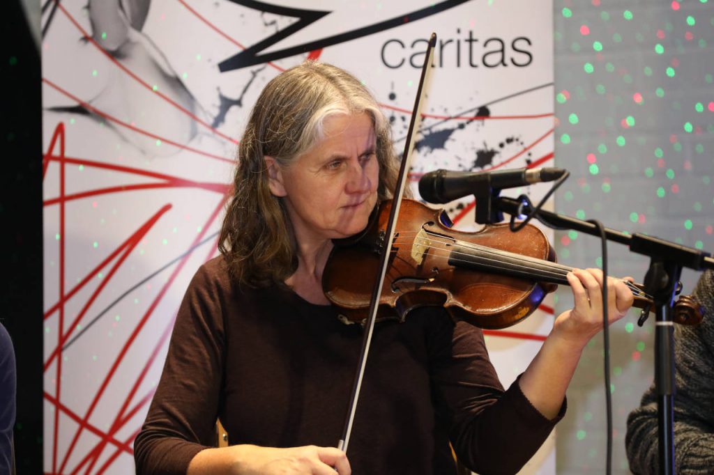 Konzert mit Flüchtlingen, Caritas